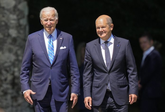 Biden travels to Germany for discussions on Ukraine and the Middle East.