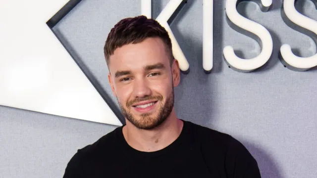 **Former One Direction Star Liam Payne Dies After Fall in Buenos Aires** Former One Direction singer Liam Payne has tragically passed away at the age of 31 after falling from a third-floor balcony at a hotel in Buenos Aires. Argentine police confirmed the death on Wednesday, stating they were called to the hotel in the Palermo neighborhood, where they found Payne's body in the hotel’s interior patio. The British singer, who had been staying at the hotel during a visit to Argentina, reportedly fell while under the influence of drugs and alcohol. Hotel staff had called the police earlier in the day, reporting an 